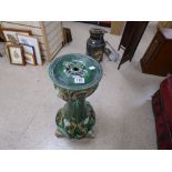 AN ART NOUVEAU GREEN MAJOLICA JARDINERE STAND TULIP PATTERN 73CM TALL