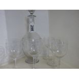 A SET OF FIVE BACCARAT CRYSTAL WINE GLASSES AND A DECANTER, EACH WITH ETCHED DECORATION OF FLOWING