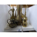 A COLLECTION OF NORTH AFRICAN BRASS WARE INCLUDING COFFEE POTS