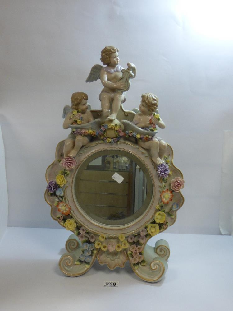 AN EARLY 20TH CENTURY CERAMIC MANTLE MIRROR IN THE MEISSEN STYLE, HIGHLY DECORATED THROUGHOUT WITH