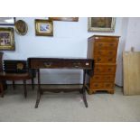 AN EDWARDIAN MAHOGANY TABLE WITH TILTING ENDS AND TWO DRAWS TO THE FRONT, 88CM WIDE