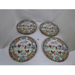 NINE LATE 19TH CENTURY CHINESE DINNER PLATES IN THE FAMILLE ROSE DESIGN, EACH PLATE DEPICTING