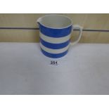 A T.G GREEN “CORNISH KITCHEN WARE” BLUE AND WHITE CERAMIC POURING JUG, 13CM HIGH