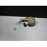 A ROYAL DOULTON CERAMIC FIGURE OF A BADGER, HN 2666, 13CM LONG