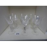 A SET OF NINE WATERFORD CRYSTAL GLASS WINE GLASSES, THREE LARGE AND SIX SMALLER EXAMPLES