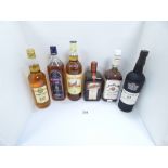 SEVERAL BOTTLES OF ALCOHOL INCLUDING BUSHMILLS 12 YR OLD WHISKY, JOHN BARR, FAMOUS GROUSE 1L,