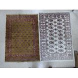 TWO MIDDLE EASTERN RUGS, 116CM BY 79CM