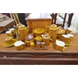 AN EXTENSIVE COLLECTION OF HORNSEA POTTERY, COMPRISING TEA CUPS, POURING VESSELS, LIDDED TUREENS AND