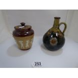 AN EARLY 20TH CENTURY ROYAL DOULTON STONEWARE EGYPTIAN PATTERN TOBACCO JAR WITH LID, TOGETHER WITH A