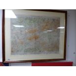 A FRAMED AND GLAZED VINTAGE PRINT OF A MAP OF DORKING AND LEITH HILL