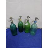 FOUR 20TH CENTURY GLASS SODA SYPHONS, 34CM HIGH