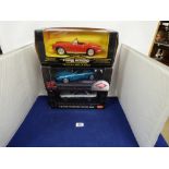 THREE 1:18 SCALE MODEL CARS, COMPRISING 1962 CORVETTE, ASTON MARTIN DB7 AND NISSAN SKYLINE GTR,