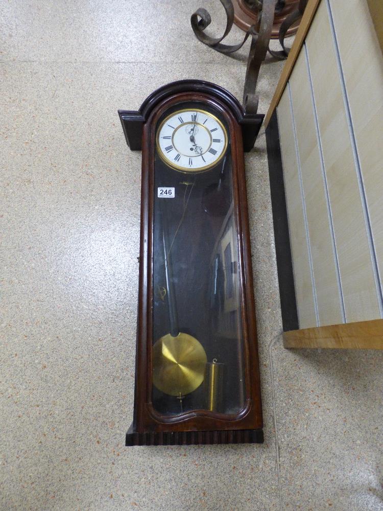 A MAHOGANY CASED WALL CLOCK