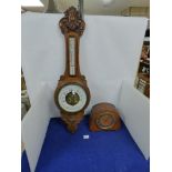 AN OAK BAROMETER BY GOLDSMITHS CO OF NEWCASTLE ON TYNE, 89CM LONG, TOGETHER WITH A SMITHS ENFIELD