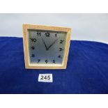 A 20TH CENTURY DESK CLOCK OF RECTANGULAR FORM WITH PINK SHAGREEN STYLE CASING, 12.5CM DIAMETER