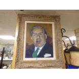 AN OIL ON CANVAS PORTRAIT OF AN OLDER GENTLEMAN IN A SUIT AND TIE UNSIGNED BUT IN AN ORNATE FRAME,