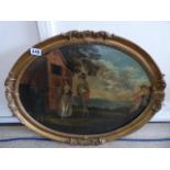 AN ANTIQUE OIL ON BOARD OF LOVERS IN A GARDEN IN AN GILDED GESSO ORNATE OVAL FRAME, 69CM BY 53CM