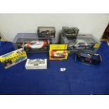 GROUP OF SCALE MODEL VEHICLES, INCLUDING MAISTO 1:18 MERCEDES CLK-GTR, MERCEDES F1 CAR, VANGUARDS