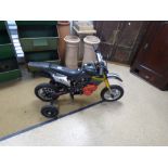 A CHILDS MINI MOTORBIKE. UNTESTED