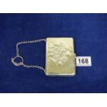 AN EDWARDIAN SILVER PURSE WITH REYNOLDS ANGELS/CHERUBS EMBOSSED DECORATION TO BOTH SIDES, HALLMARKED