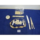 COLLECTION OF IVORY AND BONE ITEMS, INCLUDING GLOVE STRETCHERS, NECKLACES, LIDDED POT AND MORE