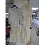 A 1940s FULL LENGTH WEDDING DRESS TOGETHER WITH A BEJEWELLED FULL LENGTH EVENING DRESS