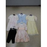 FOUR PATRICIA SMITH GIRLS' DRESSES AND A PAIR OF PANTALOONS