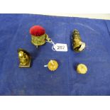 FIVE LATE 19TH/EARLY 20TH CENTURY NOVELTY TAPE MEASURES, INCLUDING BILLIKEN, PIN CUSHION BY DRGM,