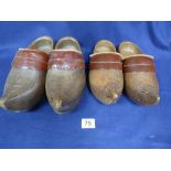 TWO PAIRS OF CARVED WOODEN DUTCH CLOGS, LARGEST PAIR 31CM IN LENGTH