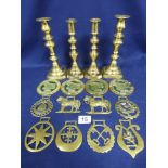 TWO PAIRS OF BRASS CANDLESTICKS WITH HORSE BRASSES