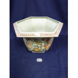 A LARGE CHINESE CERAMIC JARDINERE OF HEXAGONAL FORM , DETAILED THROUGHOUT WITH POLY-CHROME ENAMEL