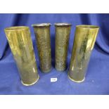 TWO PAIRS OF BRASS TRENCH ART SHELL CASE VASES, ONE WITH FRENCH ENGRAVING TO FRONT AND DATED 1944,
