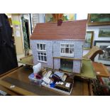 A LARGE TUDOR STYLE 1970S TWO STOREY DOLLS HOUSE WITH A QUANTITY OF VINTAGE DOLLS HOUSE MINIATURE