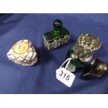 TWO SIMILAR GLASS AND WHITE METAL PERFUME BOTTLES AND A SIMILAR HEART SHAPED PORCELAIN EXAMPLE