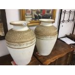 PAIR OF WHITE AND GOLD TERRACOTTA VASES