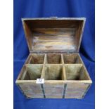 A VINTAGE CAMPHOR WOOD CHEST SHAPED AS A TREASURE CHEST, THE LID OPENING TO REVEAL SIX