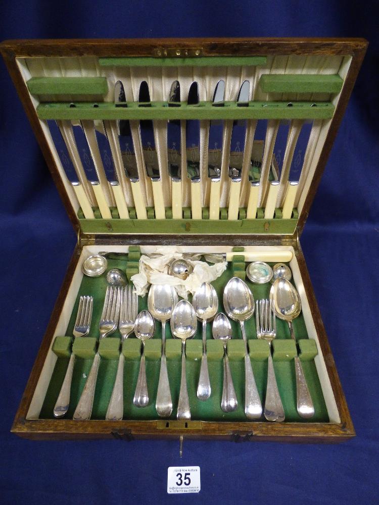 AN OAK BOXED CANTEEN OF CUTLERY BY RICHARDSON AND BINNEY LTD OF SHEFFIELD