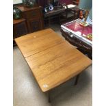 MID-CENTURY DINNING TABLE IN TEAK