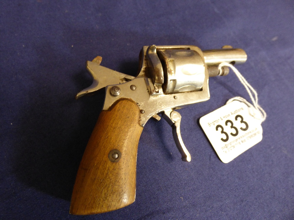 A DEACTIVATED REVOLVER PISTOL WITH FOLDING TRIGGER AND WOODEN MOUNTED METAL GRIP, 12.5CM IN LENGTH - Image 2 of 4