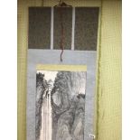 AN ORIENTAL JAPANESE CHINESE WALL HANGING OF A WATERFALL AND TREES AND BEARING SIGNATURE, DROP 184