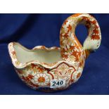 A 19TH CENTURY CHINESE HAND PAINTED POTTERY SWAN WITH MAPLE LEAF AND CHRYSANTHEMUM DECORATION