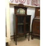 EDWARDIAN BOW FRONTED GLASS AND MAHOGANY DISPLAY UNIT
