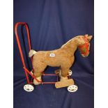 A CHILDS PEDIGREE “SOFT TOY” PUSH ALONG HORSE, MADE IN GREAT BRITAIN BY ROVEC TRIANG, 60CM HIGH BY