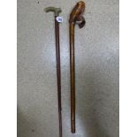 A BRASS HANDLED WALKING STICK