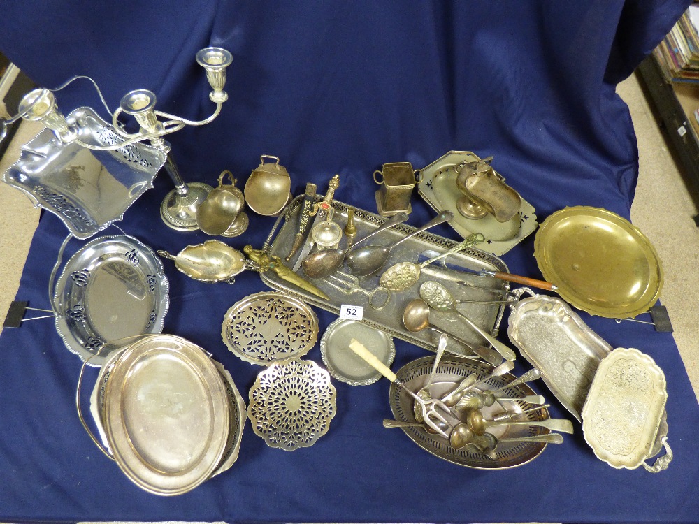 A LARGE BOX OF MIXED SILVER PLATED ITEMS INCLUDING CANDELABRA AND SPOONS