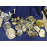 A LARGE BOX OF MIXED SILVER PLATED ITEMS INCLUDING CANDELABRA AND SPOONS