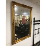 LARGE GILDED BEVELLED MIRROR. 74 X 104 CMS