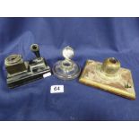 THREE VINTAGE INKWELLS, INCLUDING A BAKELITE EXAMPLE WITH PENHOLDER, A SILVER PLATE AND GLASS ONE