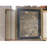 AN ANTIQUE FRAMED AND GLAZED PRINT OF A JOHN SPEED MAP 67CM BY 56CM