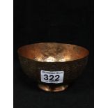 AN EASTERN COPPER BOWL WITH ENGRAVED FLORAL MOTIFS THROUGHOUT, 15CM DIAMETER